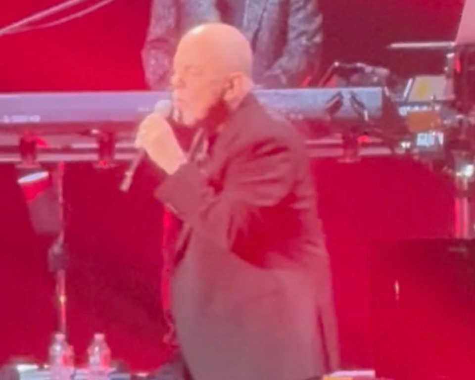 Billy Joel performing on stage.