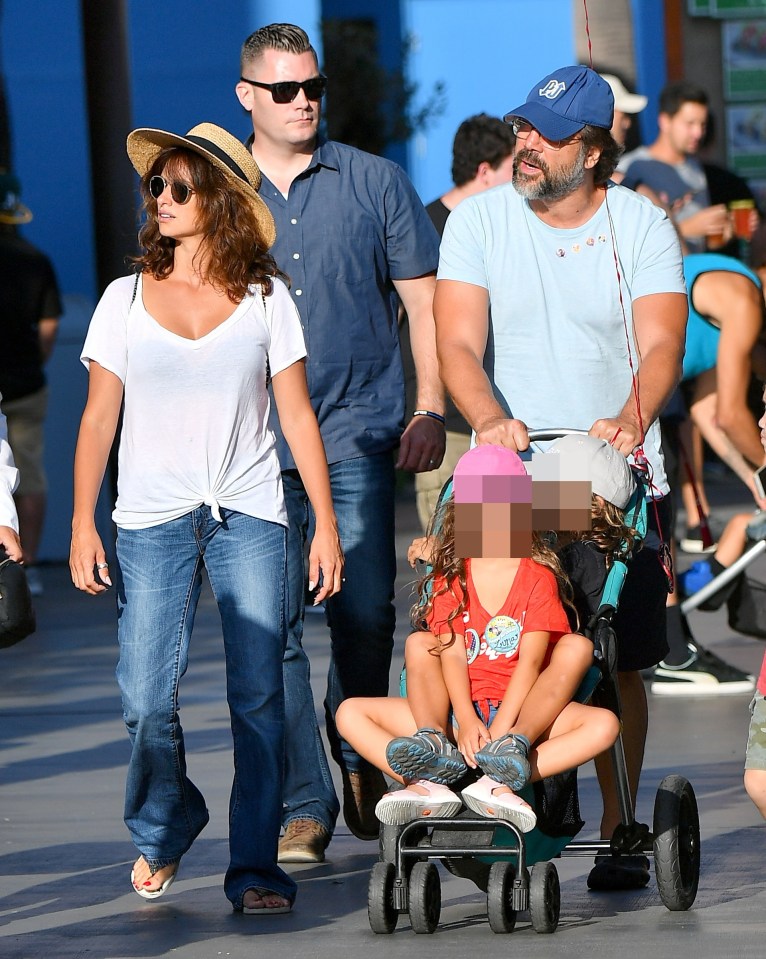 Penelope Cruz and Javier Bardem at Disneyland with their children.