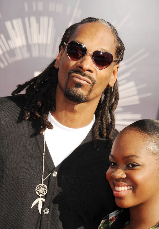 Snoop Dogg and Cori Broadus at the 2014 MTV Video Music Awards.