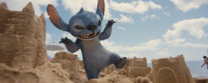 A CG Stitch destroys a sandcastle on the beach in a teaser for the 2025 live-action Lilo & Stitch