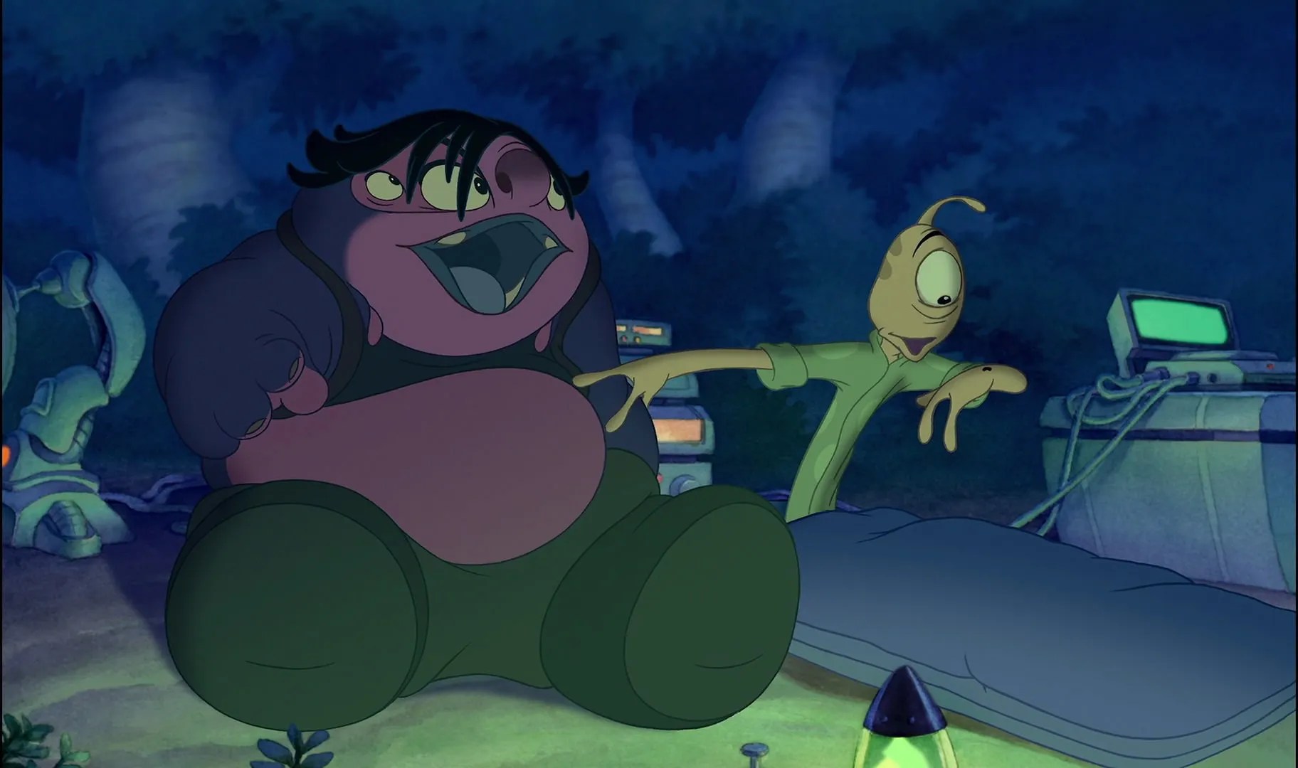 Jumba, a large bear-like alien, sitting and looking happy, while Pleakley, a rubbery green one-eyed alien looks enthralled with a mosquito on his hand.