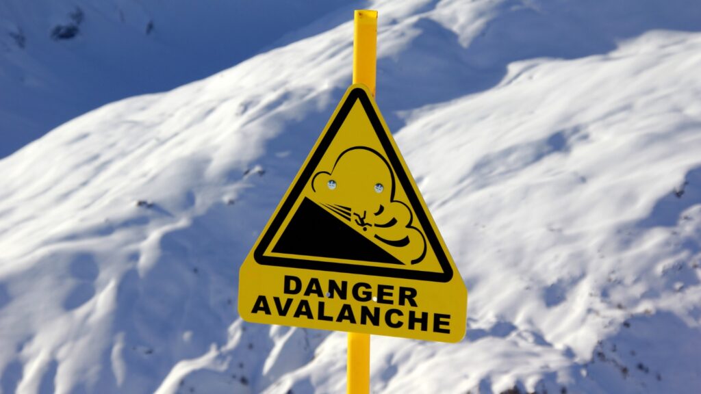 sign warning about the dangers of avalanches