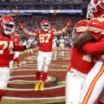 LAS VEGAS, NEVADA - FEBRUARY 11: Mecole Hardman Jr. #12 of the Kansas City Chiefs celebrates with Patrick Mahomes #15 and Travis Kelce #87 and teammates after catching the game-winning touchdown pass to defeat the San Francisco 49ers 25-22 during Super Bowl LVIII at Allegiant Stadium on February 11, 2024 in Las Vegas, Nevada. (Photo by Ezra Shaw/Getty Images)