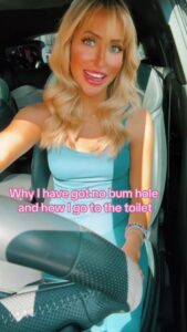 Woman in a car explaining why she has no bum hole.