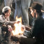 Short Round and Indy playing cards in Indiana Jones and the Temple of Doom