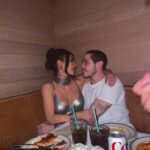 Kim Kardashian and Pete Davidson sharing a meal.