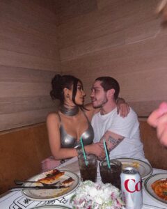 Kim Kardashian and Pete Davidson sharing a meal.