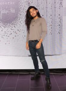 Hair stylist Jesus Guerrero at a store opening.