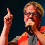 Mark Mothersbaugh Of Devo Says His 50-Year-Old Song Still Makes Him $1 Million A Year As "The Most Played Song On MTV"