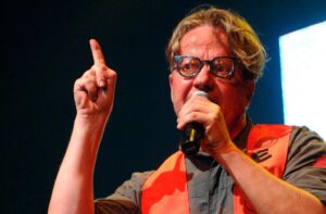 Mark Mothersbaugh Of Devo Says His 50-Year-Old Song Still Makes Him $1 Million A Year As "The Most Played Song On MTV"