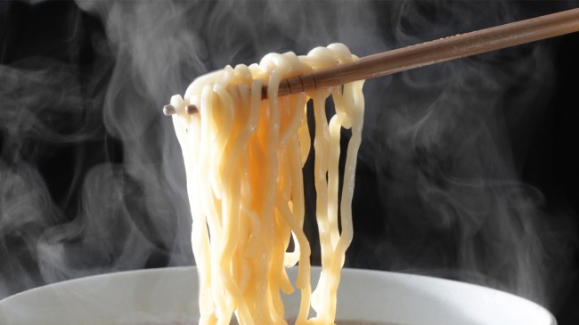 steaming bowl of ramen with chopsticks