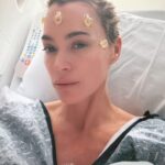 Teddi Mellencamp in a hospital bed, undergoing medical treatment.