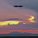 ufo in the sky at dusk