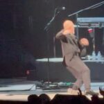 Billy Joel falling on stage while performing.