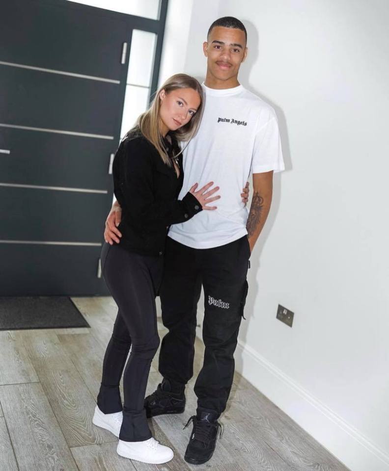 Photo of Mason Greenwood and Harriet Robson embracing.