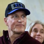 Woody Harrelson wearing a Rhode Island Film and Television cap