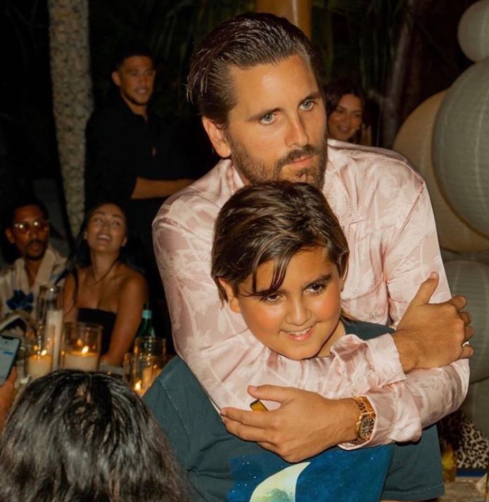 Scott Disick hugging his son Mason.