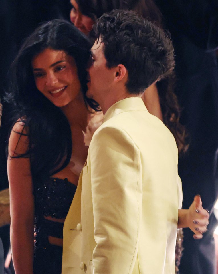 Timothee Chalamet and Kylie Jenner embracing at the Oscars.