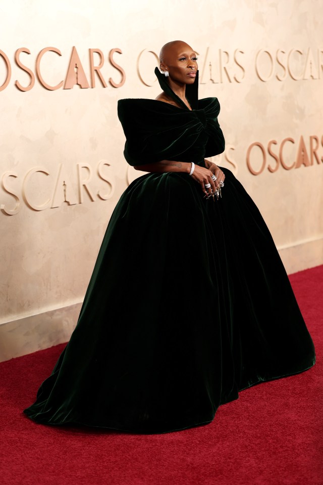 Cynthia Erivo in a dark green gown at the Oscars.