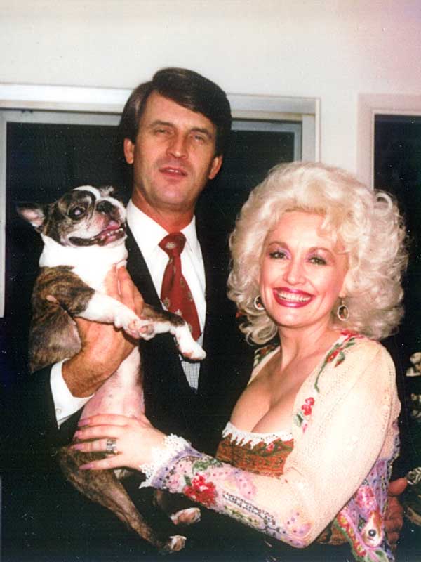 Dolly Parton and her husband Carl Dean with their dog.