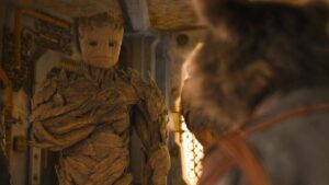 Groot looks at Rocket with his arm over his heart in Guardians of the Galaxy Vol. 3