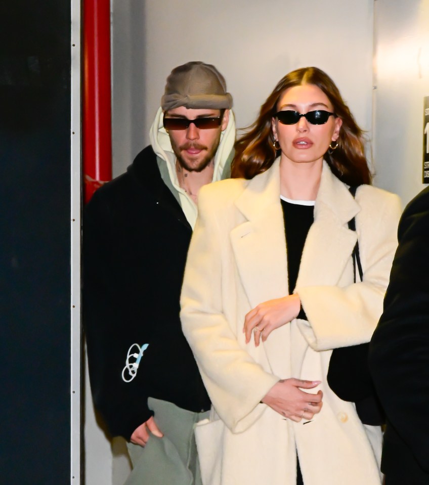 Justin and Hailey Bieber leaving a theater.