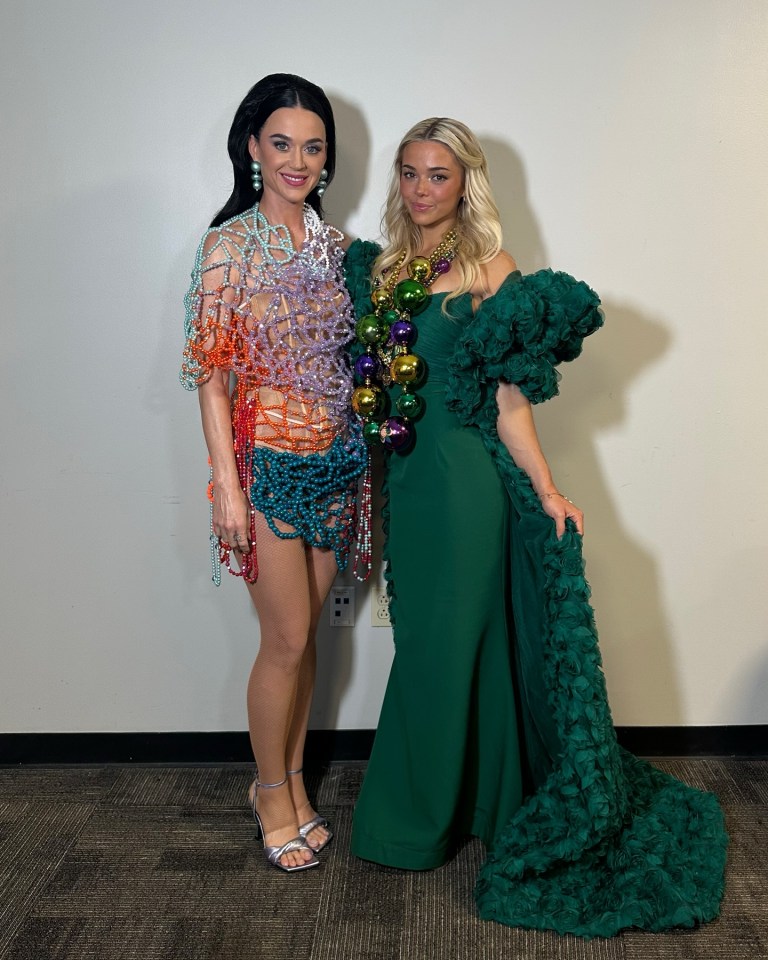 Katy Perry and Olivia Dunne posing together.