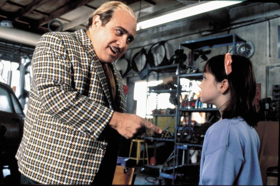 Danny DeVito and Mara Wilson in a scene from Matilda.