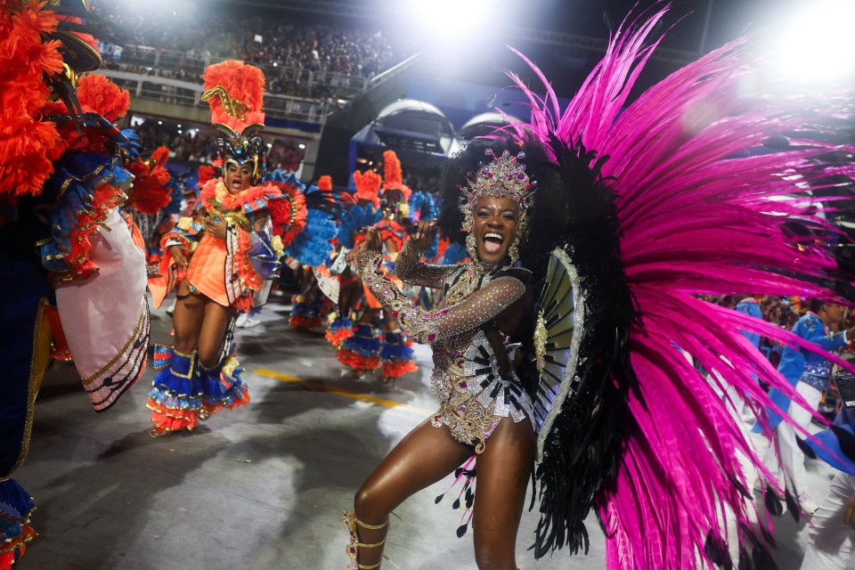 A drum queen in elaborate costume performs at Rio de Janeiro's Carnival.