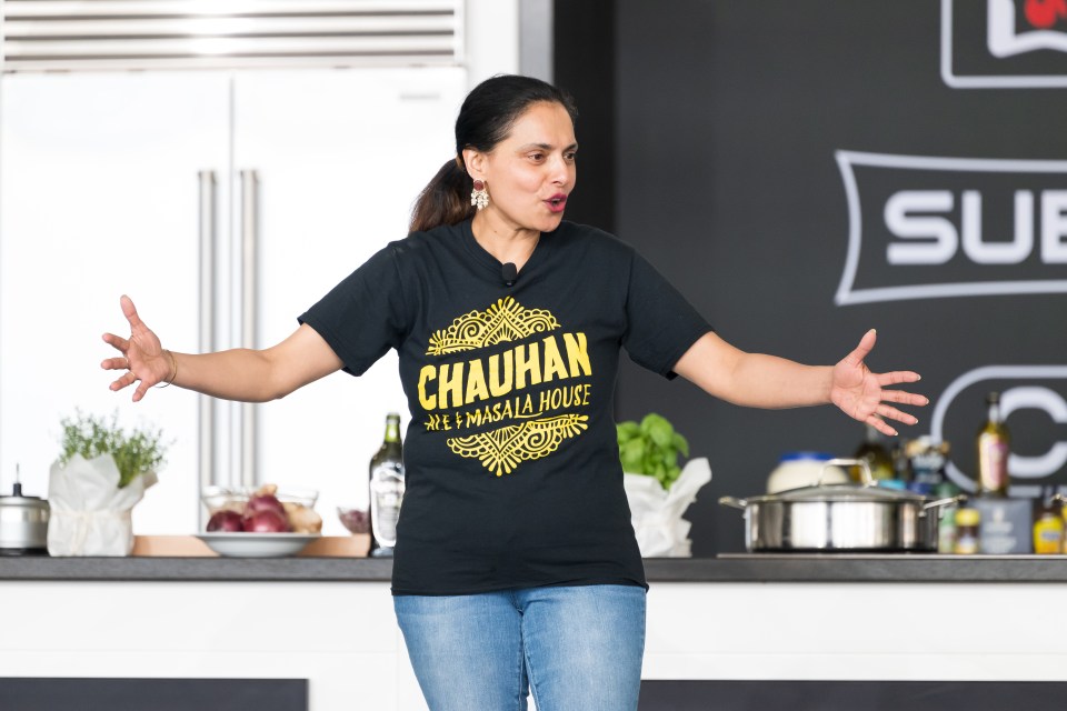 Maneet Chauhan giving a cooking demonstration.