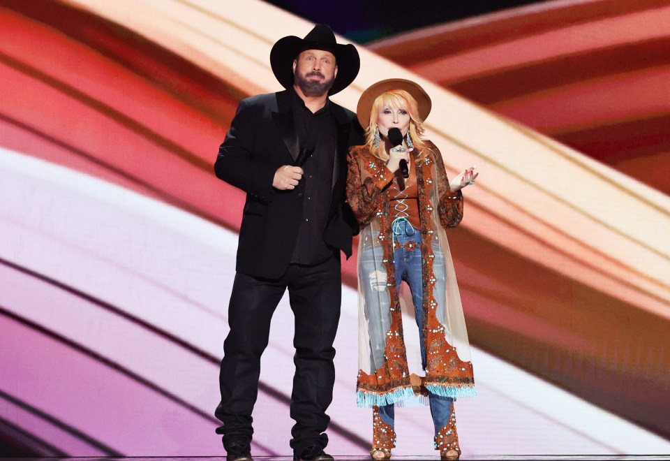 Garth Brooks and Dolly Parton onstage at the Academy of Country Music Awards.