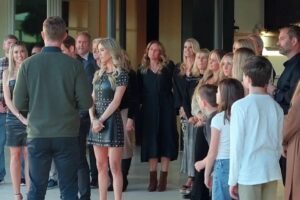 Christina Haack and her new boyfriend, Christopher Larocca, with a group of people.