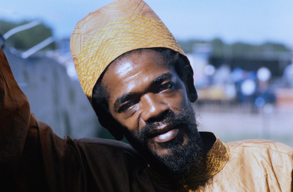 Photo of Cocoa Tea backstage at a reggae festival.