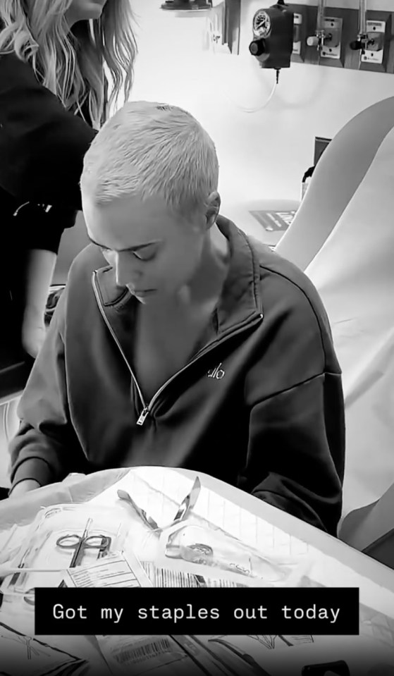 Black and white photo of Teddi Mellencamp having surgical staples removed.