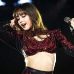 Thai rapper and singer Lisa, from South Korean group Blackpink, performs during the New Year's Eve celebrations in Bangkok on December 31, 2024. (Photo by Chanakarn Laosarakham / AFP) (Photo by CHANAKARN LAOSARAKHAM/AFP via Getty Images)