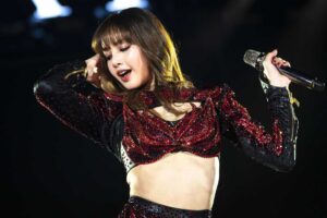 Thai rapper and singer Lisa, from South Korean group Blackpink, performs during the New Year's Eve celebrations in Bangkok on December 31, 2024. (Photo by Chanakarn Laosarakham / AFP) (Photo by CHANAKARN LAOSARAKHAM/AFP via Getty Images)