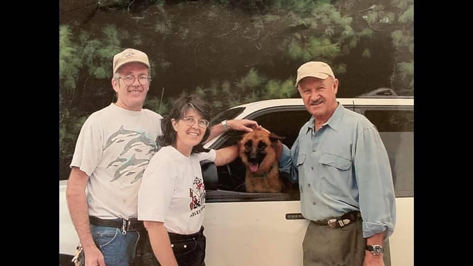 Gene Hackman and his family with their newly adopted dog.