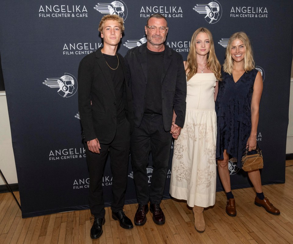 Liev Schreiber and family at a film premiere.