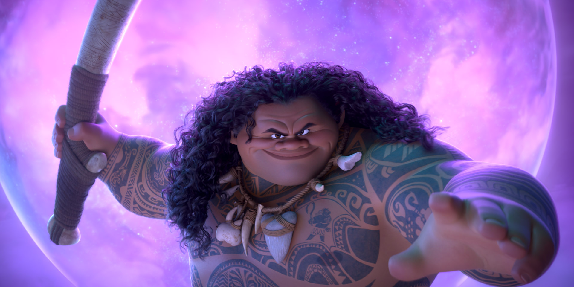 Maui (voice of Dwayne Johnson), the long-haired, tattoo-covered demigod of the Moana movies, brandishes his giant hook weapon and smirks in Moana 2