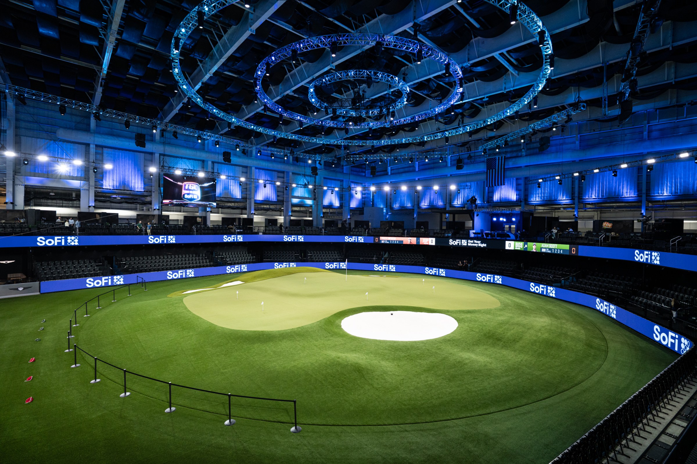 An overhead shot of the green area at the TGL stadium.