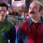 John Leguizamo in green as Luigi and Bob Hoskins in red with a mustache as Mario in Super Mario Bros.