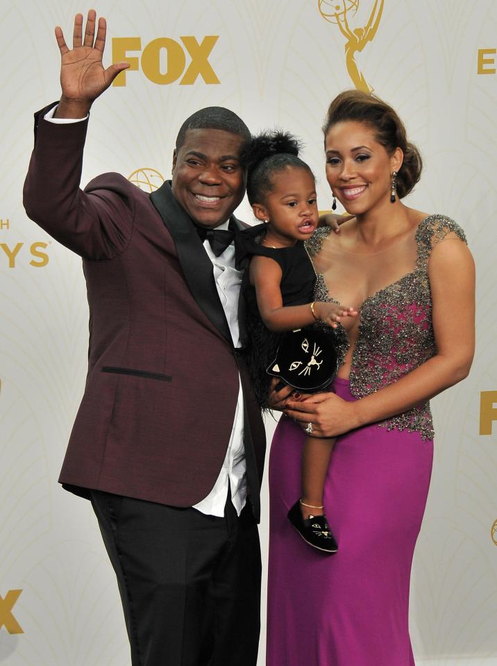 Tracy Morgan, his daughter Maven Sonae Morgan, and his wife Megan Wollover at the Emmy Awards.