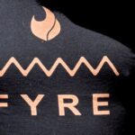 attendee wears a Fyre Festival shirt