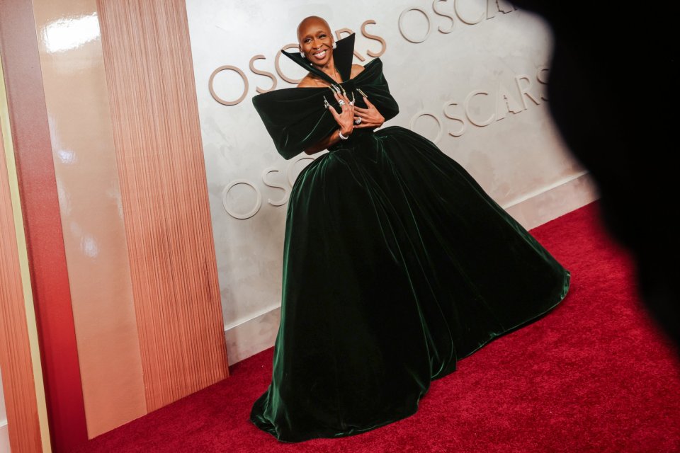 Cynthia Erivo in a dark green velvet gown at the Oscars.