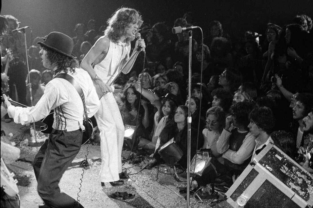 The New York Dolls perform at the Waldorf-Astoria Hotel in New York on Oct. 31, 1973. At right is lead singer David Johansen, with guitarist Sylvain Sylvain.