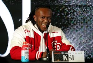 KSI at a press conference.