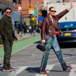 Gigi Hadid and Bradley Cooper hailing a cap in NYC