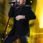 Billy Joel performing on stage.