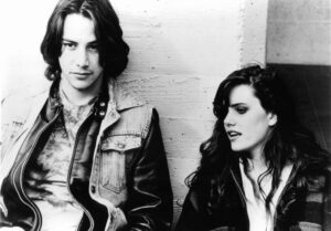 Reeves and Skye in a black and white still from the 1986 film "River's Edge."