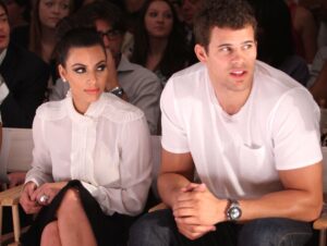 Kim Kardashian and Kris Humphries attend the Abbey Dawn by Avril Lavigne Spring 2012 fashion show on Sept. 12, 2011, in New York City.